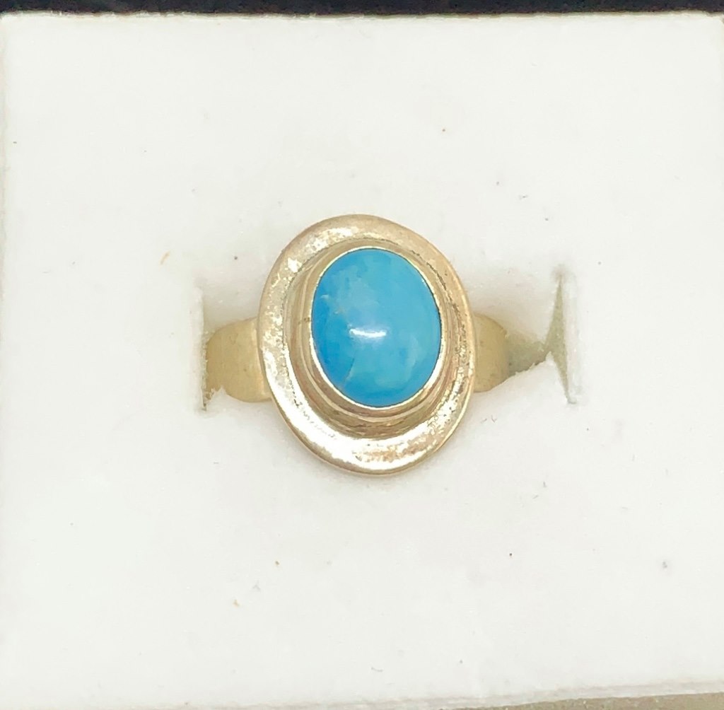 Bague en argent avec une petite turquoise ovale